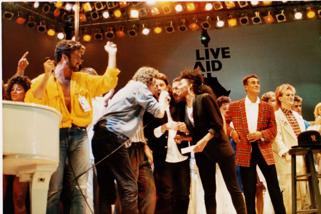 ap **file** british and irish singers perform on stage at the live aid concert at wembley stadium, london, england, on july 13, 1985.  from left are george michael of wham,  bob geldolf, bono of u2, freddie mercury of queen, andrew ridgley of wham! and howard jones. it may be hard for next month's live 8 concert to be as historic or even heart-warming as the 1985 live aid show, one of the greatest rock concerts of all time.  (ap photo) a july 13 1985 file photo  music live aid automatarkiverad